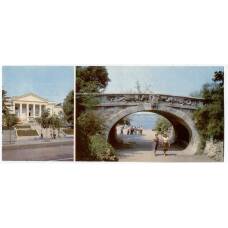Открытка Крым.Севастополь —  Кинотеатр «Победа». Пешеходный арочный мостик на Приморской бульваре