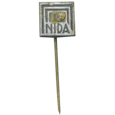 Значок рекламный NIDA