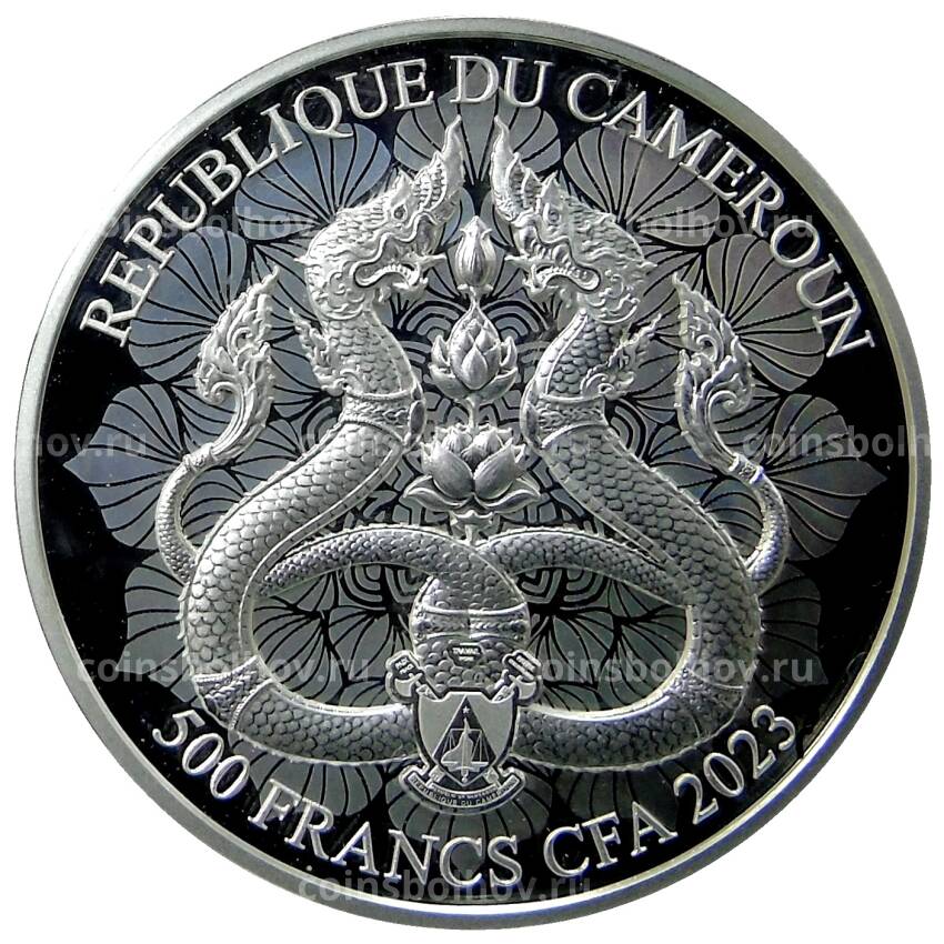 Монета 500 франков 2023 года Камерун — Нага (человек-змея, синий фон, цветная) (вид 2)