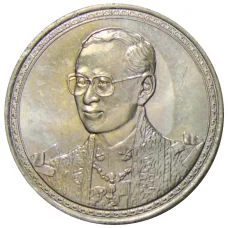 Монета 20 бат 2002 года Таиланд  — 75 лет со дня рождения Короля Рамы IX (аверс)