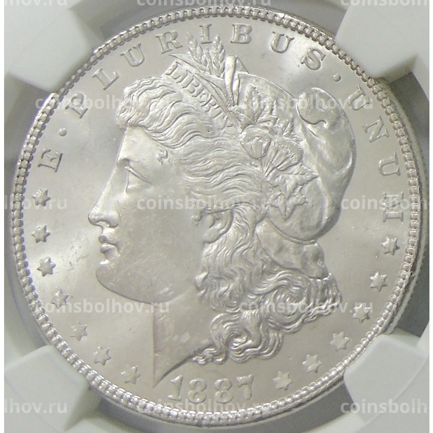 Монета 1 доллар 1887 года США «Доллар Моргана» (в слабе NGC MS 63)