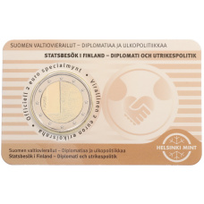 Монета 2 евро 2025 года Финляндия «Дипломатия и внешняя политика» (Бежевый блистер — надписи на лицевой стороне на финском) (аверс)