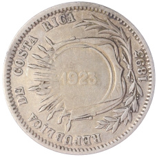 Монета 50 сентимо 1923 года — надчекан на 20 сентимо 1893 года Коста-Рика (аверс)
