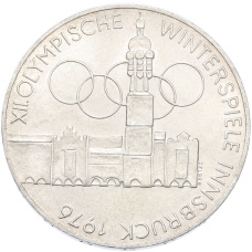 Монета 100 шиллингов 1976 года Австрия «XII зимние Олимпийские Игры 1976 в Инсбруке — Здания и Олимпийская эмблема» (аверс)